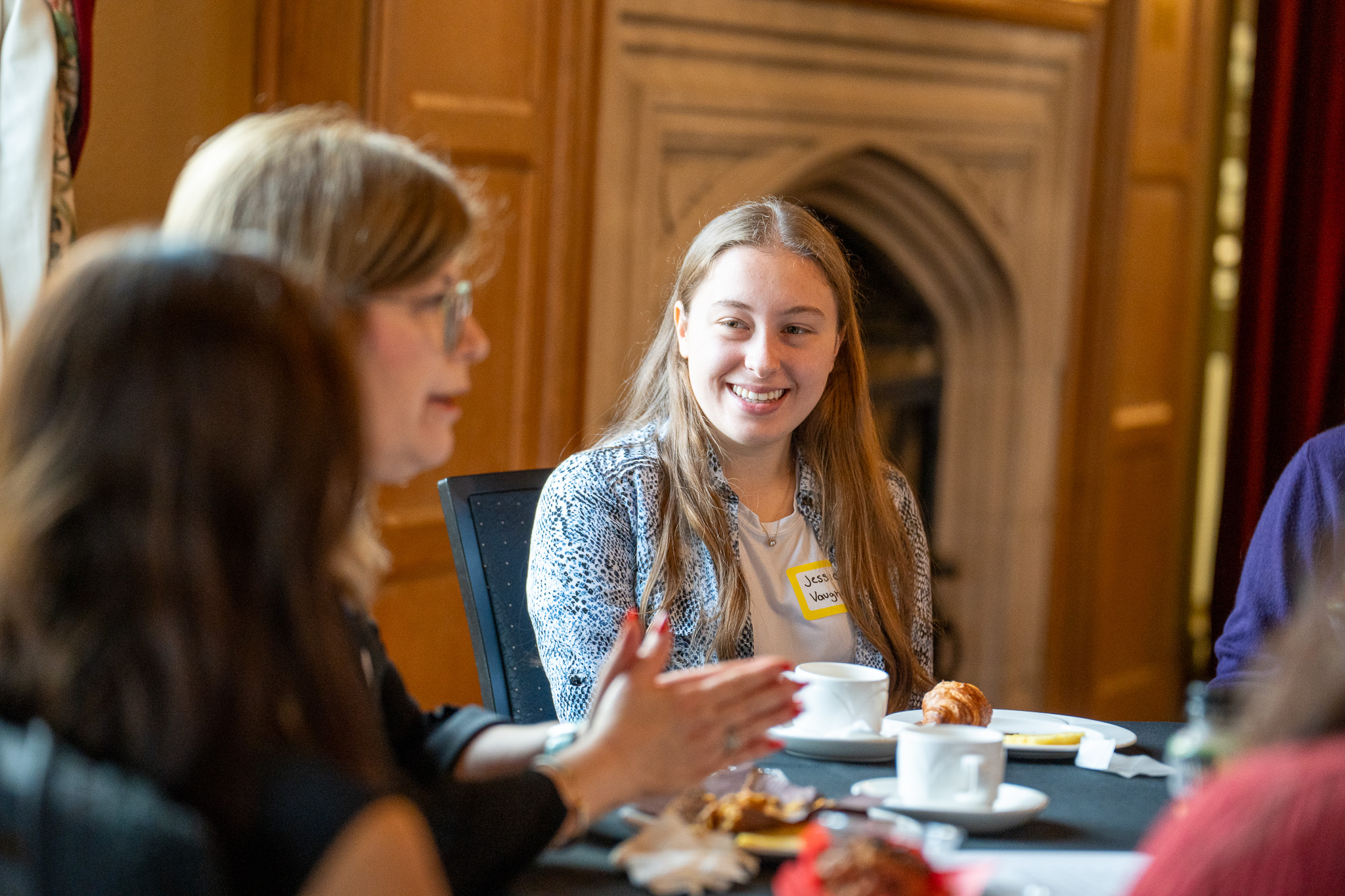 Photo of student at networking breakfast.